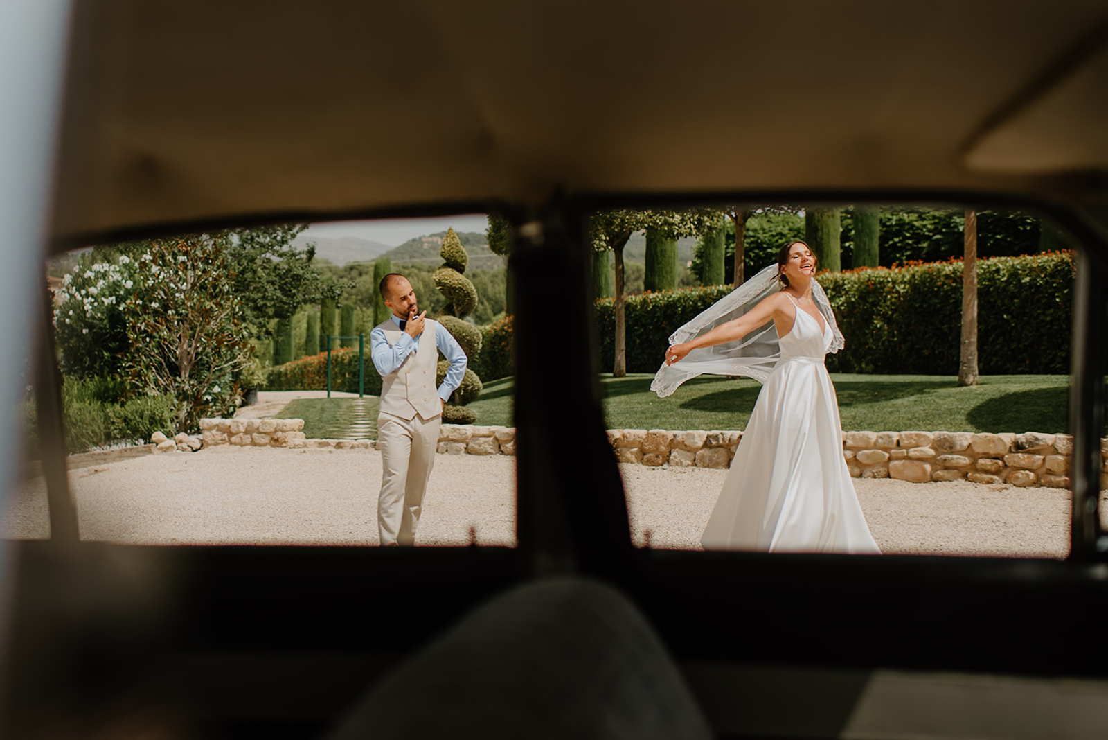 Castell de Barxell Wedding | A Romantic Spanish Countryside Celebration with Zuzanna + Raul – Reflections of the castle in the couple’s vintage car windows.