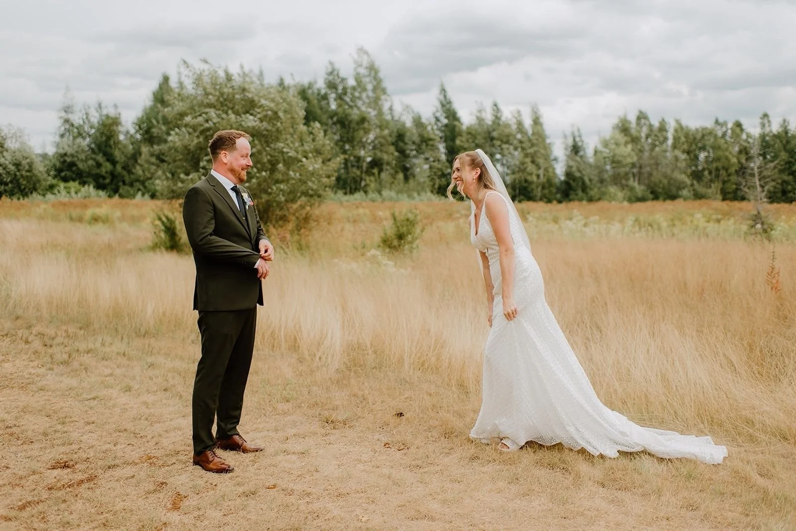 Camp Eden Woods Wedding in Ontario | Amy + Rory – Amy and Rory seeing each other for the first time during their woodsy first look.