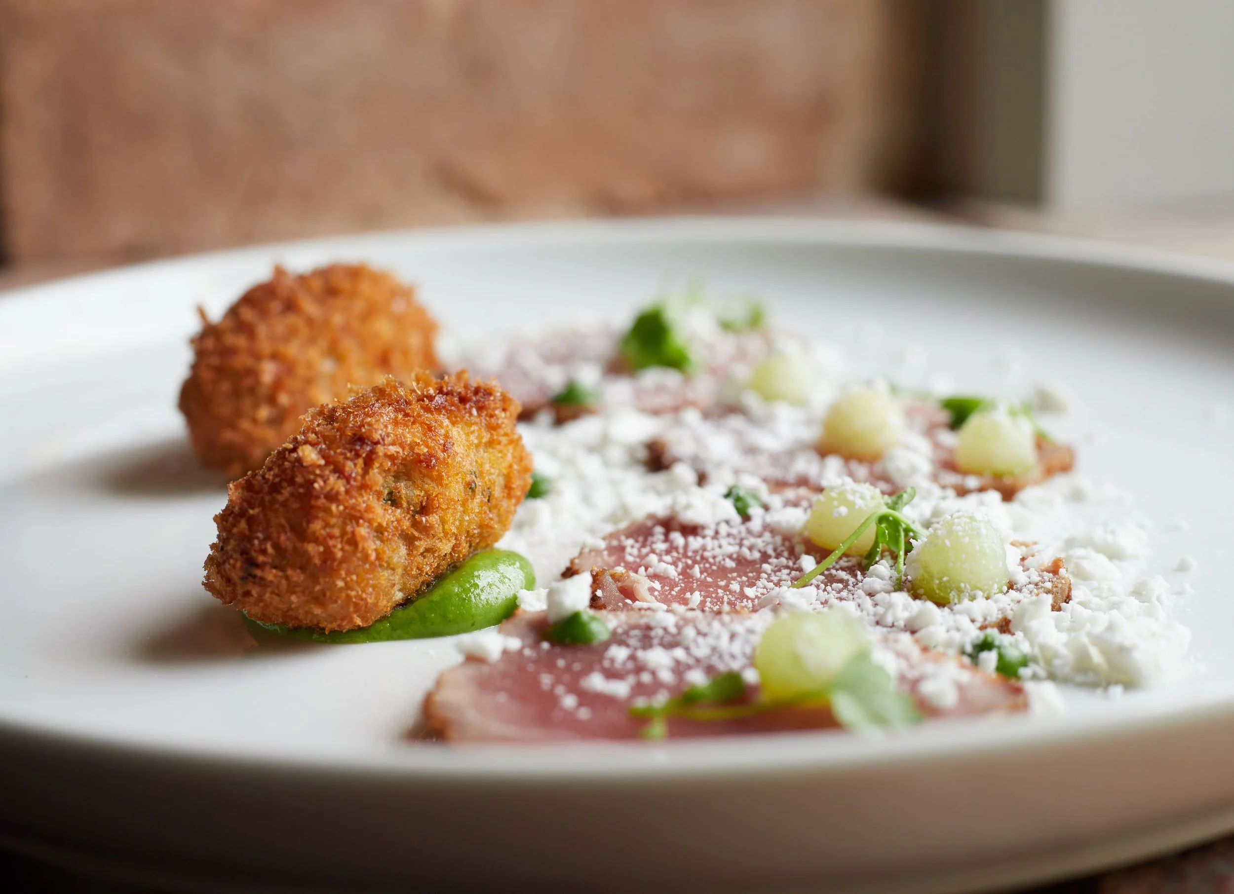 Tuna Carpaccio, Crispy Crab Cakes, Crab Emulsion, Orange, Feta Snow, Avocado Puree 19_164(compressed).jpg