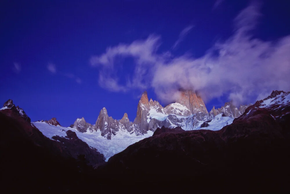 Dramatic peaks of Mount Fitz Roy jut out of the snowy landscape in Argentina. Photo: Kurt Deutmeyer