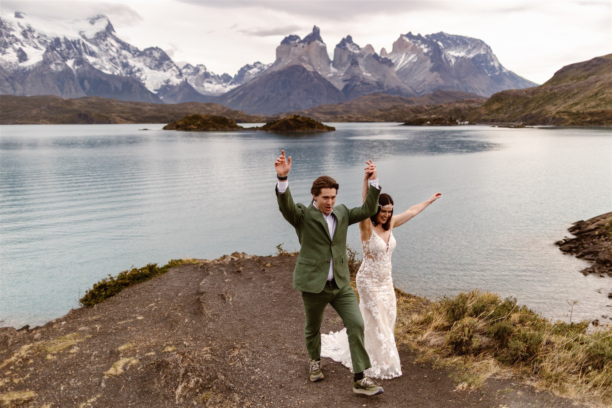Here, the newlyweds walk away from the water with their hands on the air, celebrating their union in this magical location that the bride always dreamed of.