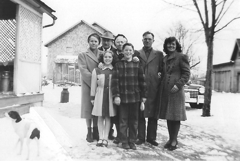Our Sunday "go to church" family on the farm. Back row, l-r; Aunt Katherine, Uncle Gus, Grandma Louise, Dad George, Mom Muriel. Front row, l-r; Janet, me. On the left, dog Trixie.