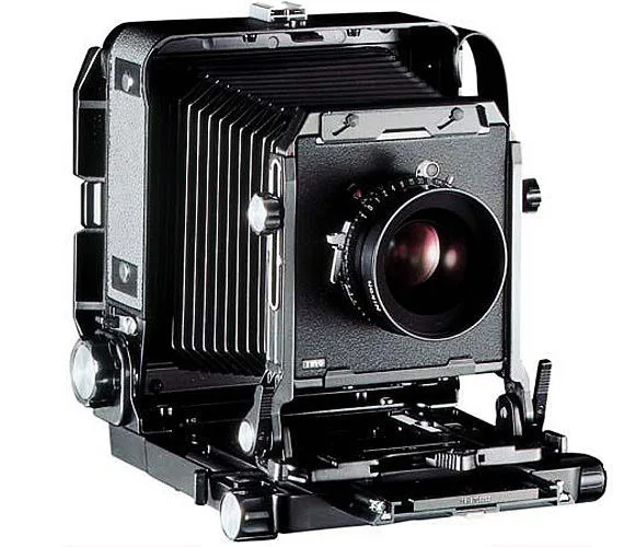 Toyo View 4x5 CF Field Camera Comes with: Dark cloth Also available: 65mm f4.5, 75mm f5.6, 90mm f6.8, 105mm f5.6 Toyo Mount wide lenses; 135mm f5.6, 150mm f6.3, 210mm f6.8 Toyo Mount normal lenses; 240mm f5.6, 300mm f9 Toyo Mount long lenses; Fotodiox for Canon, Fuji Instant Film backs; lens hoods; bag bellows