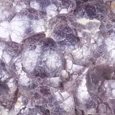 Chemical Formula: (K(Li,Al)3(Si,Al)4O10(F,OH)2)