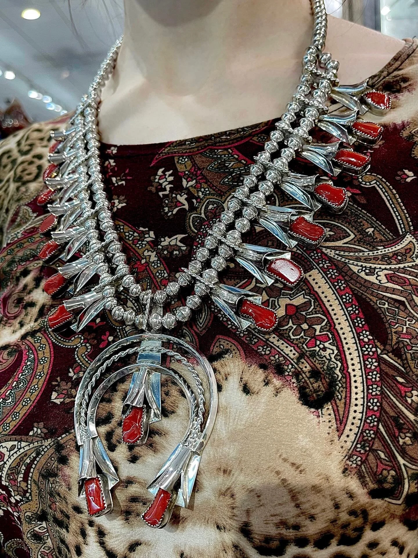 Jewelry for the maximalist ❤️&zwj;🔥

You&rsquo;ve probably seen turquoise squash blossom necklaces by now, but this red coral version absolutely deserves her moment to shine ⭐️ She&rsquo;s bold, vibrant, and impossible to ignore in the best way.

An