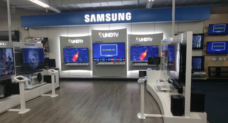 Previous system used tablet like screens for user interactions, but despite clear directions customers were still confused about how or when to interact with interface. It was a business decision to integrate physical buttons into each kiosk panel i