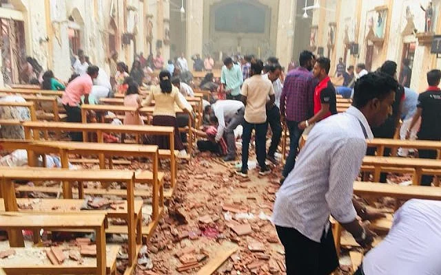 The aftermath of an explosion in St. Sebastian's Church in Negombo, Sri Lanka.