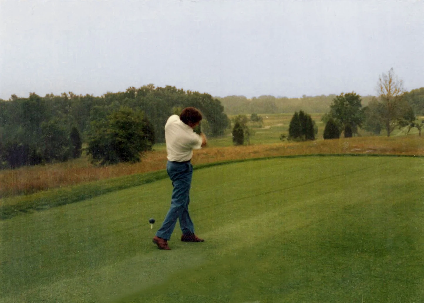 Elmore Just hits the first tee shot on opening day, 1989.