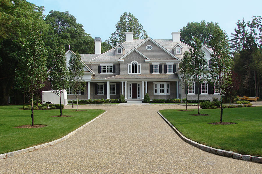 after: driveway gravel has been replaced and sky cheered up