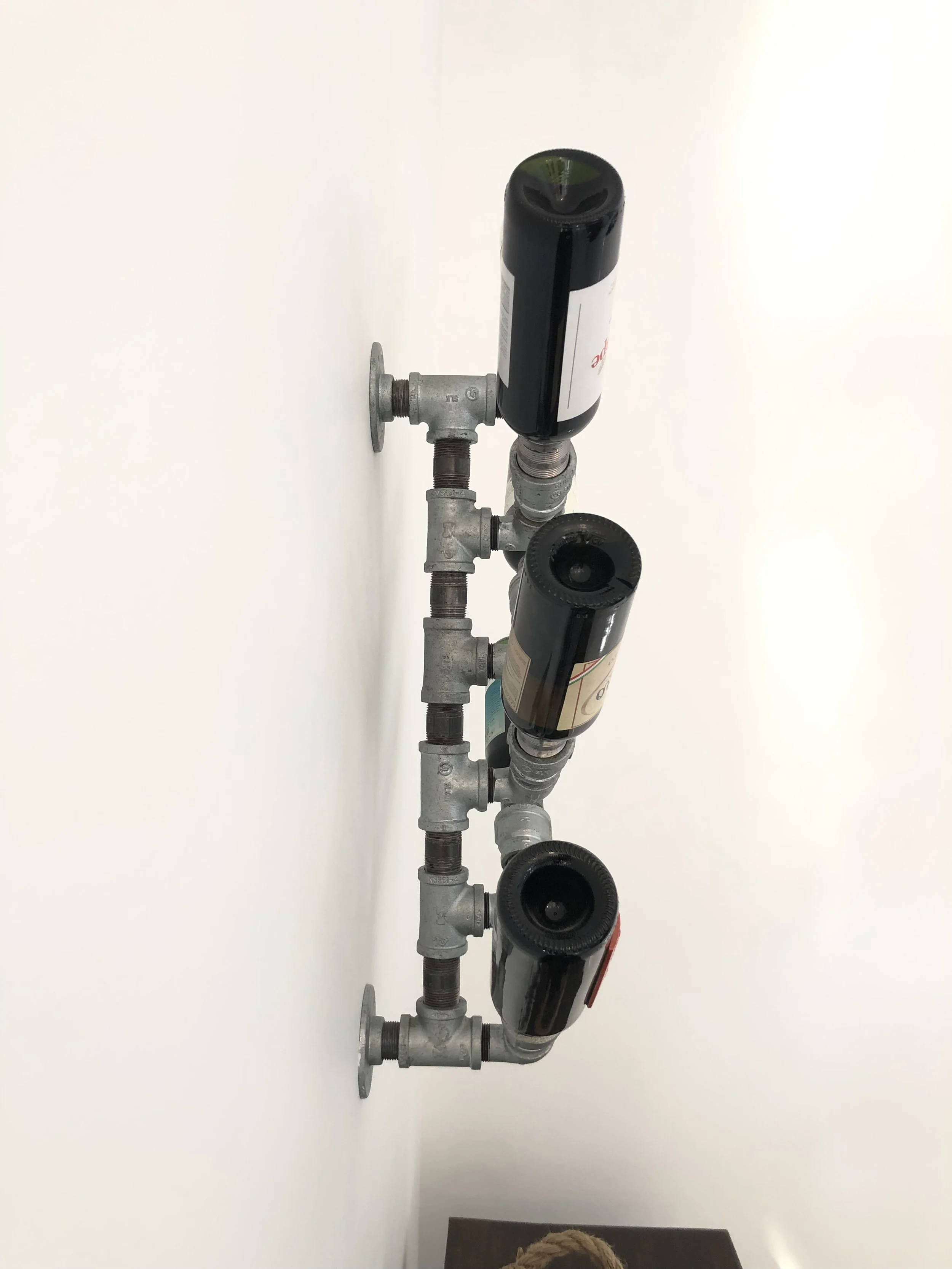 Industrial Pipe Wine Bottle Wall Mount_Side View.jpeg
