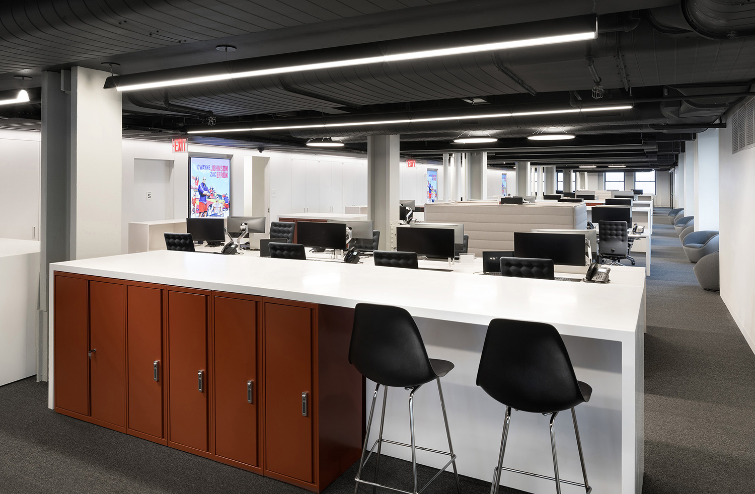 Informal work spaces in the form of high counters and seating were placed to provide for impromptu collaborations or laptop work sessions.