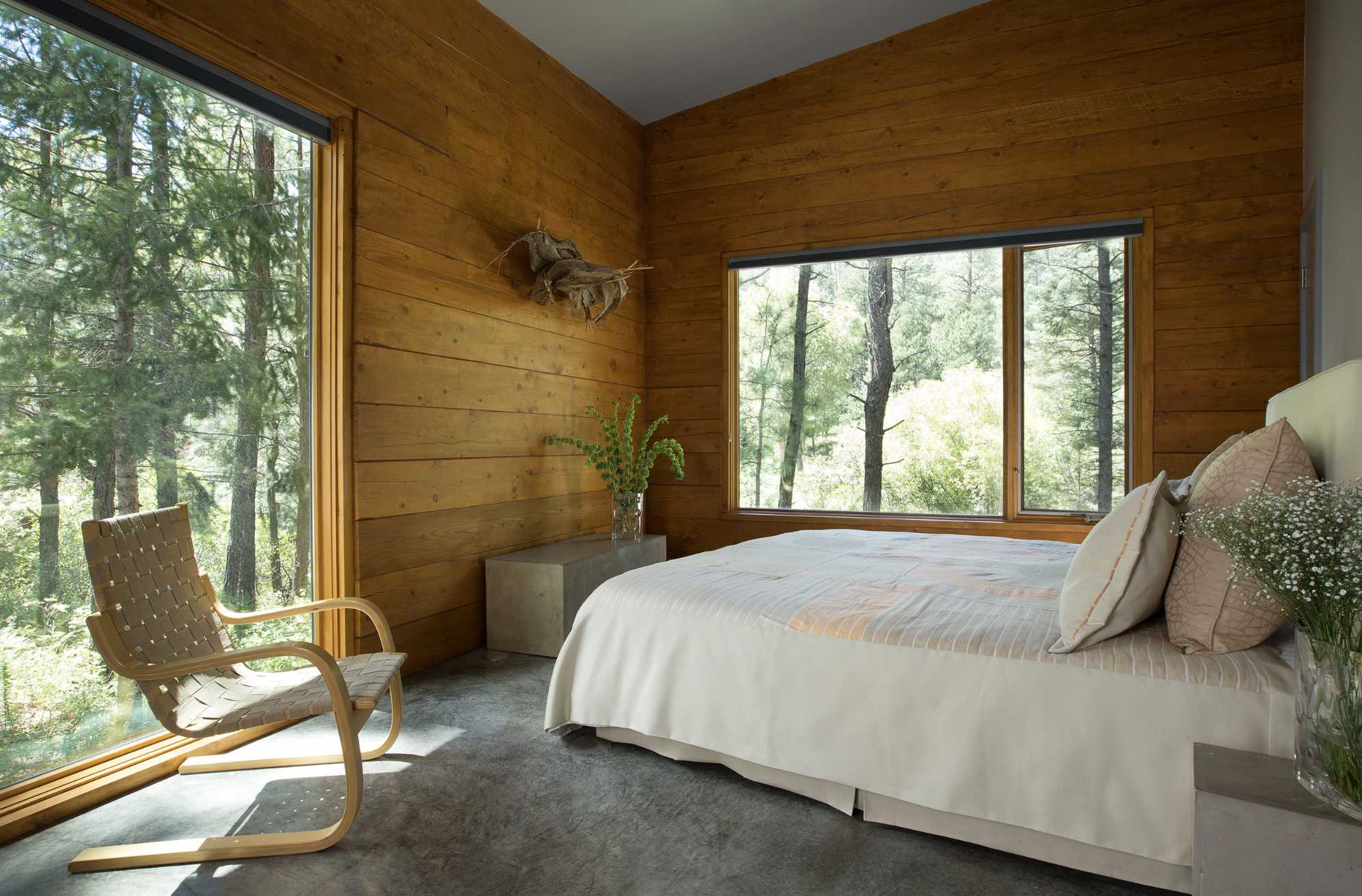 The Interior is all about solidity, shelter, intimacy, and the warmth of exposed heavy timber walls.