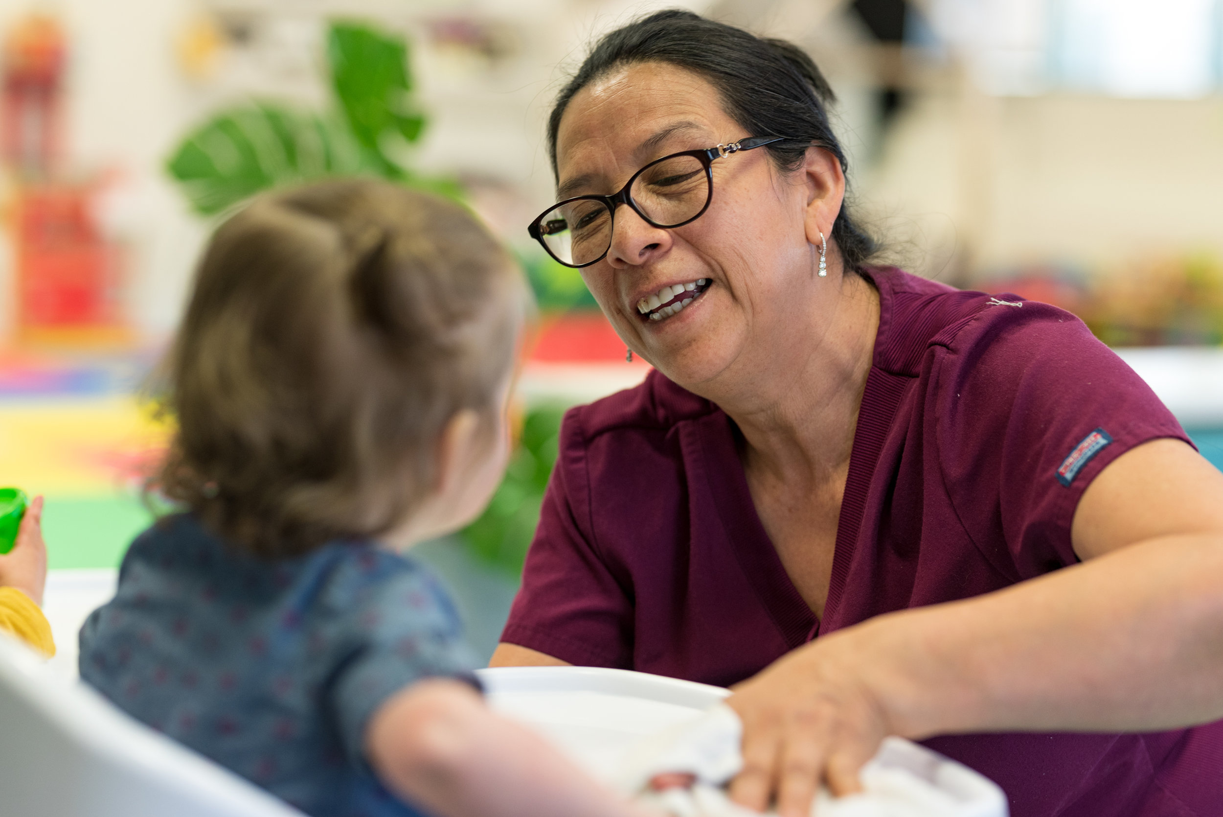 Ana Martinez, a child care worker, spends the morning singing to toddlers and serving the children their morning snacks at Wee Wild Ones Daycare in Calgary on Monday, April 8, 2019.Martinez, a mother of eight children, enjoys working with children, and along side her youngest daughter, Saly, whom also works at the daycare. (Photo by Jacob MacPherson/SAIT)