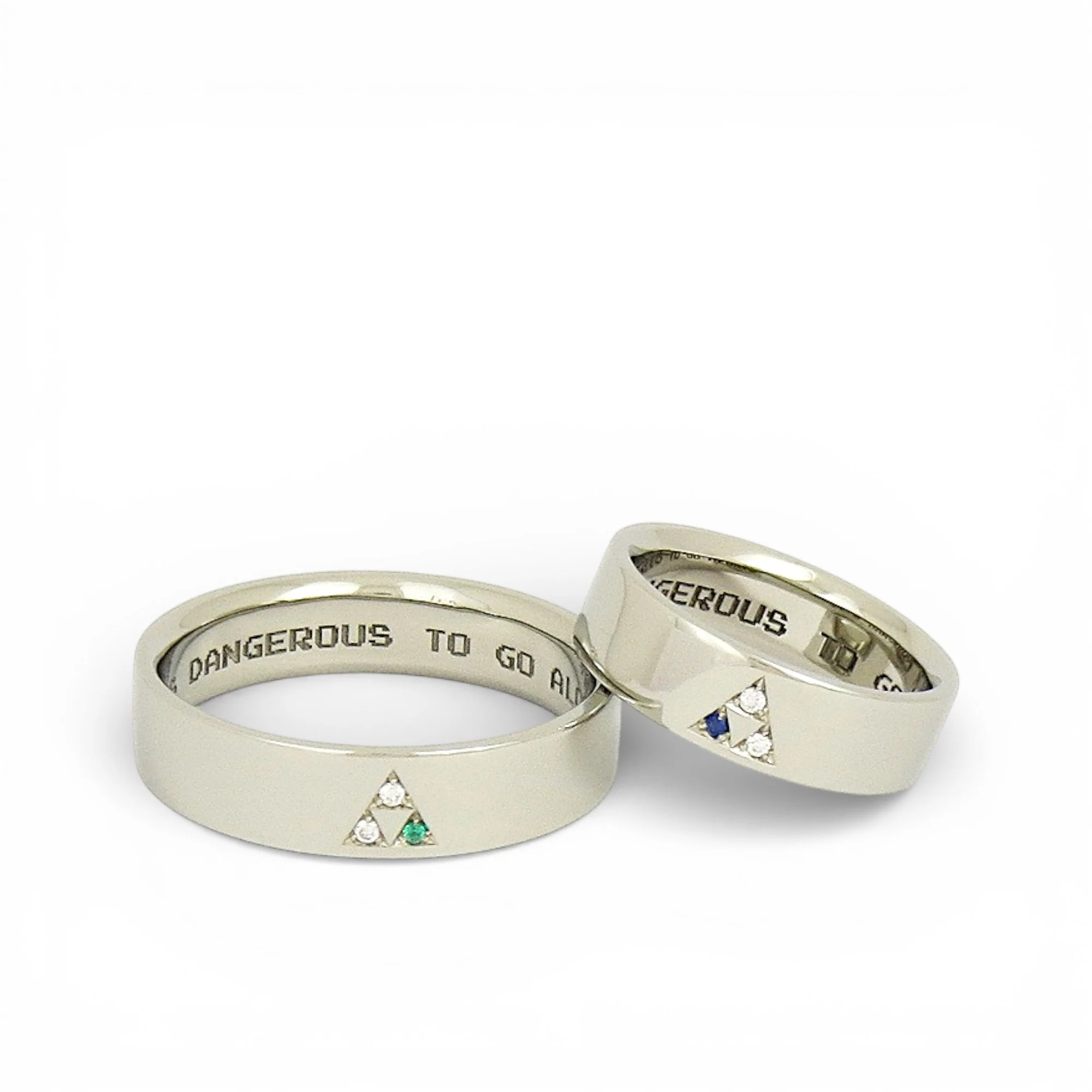 white gold ring with triforce of diamonds, sapphire, emerald in a triangular formation