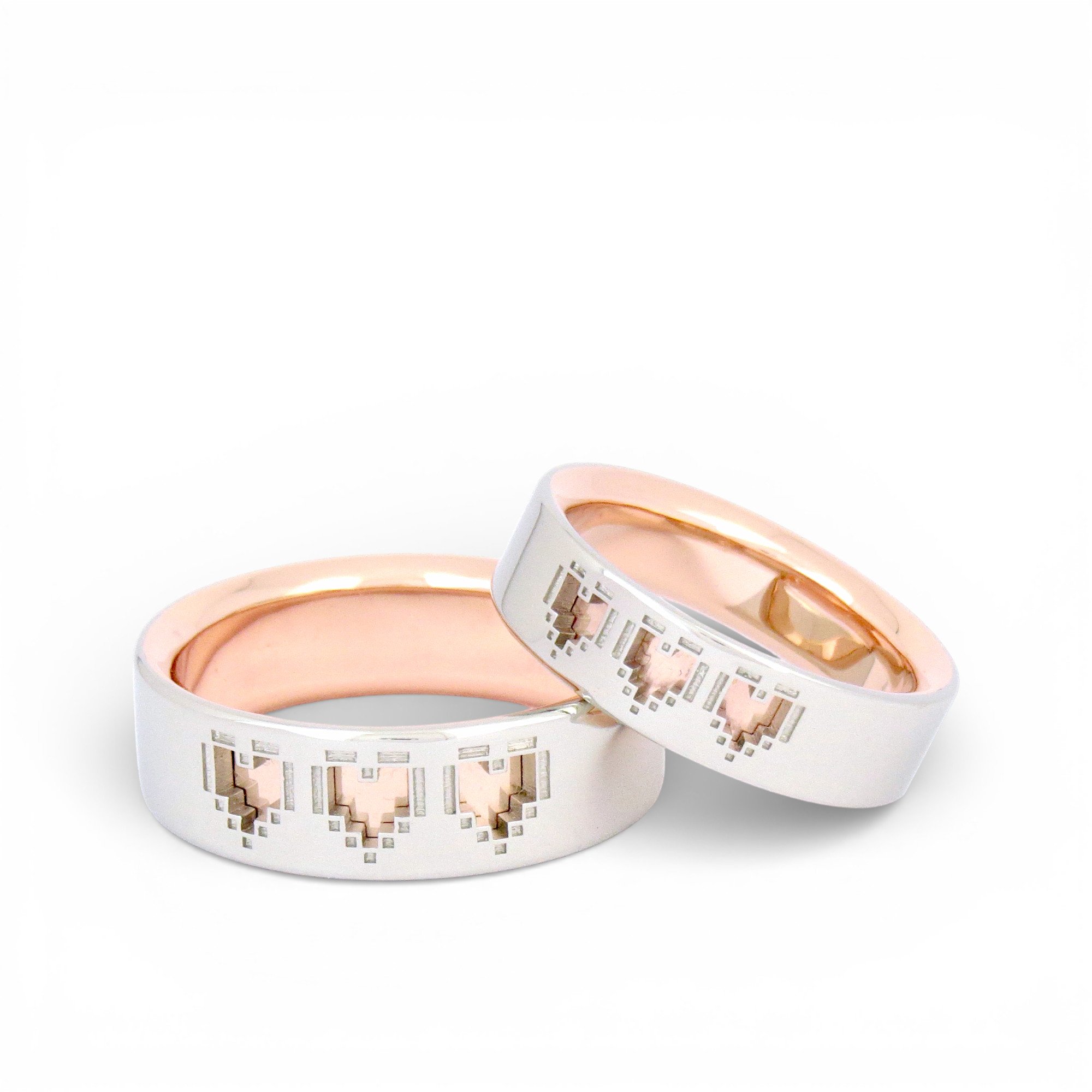 white gold and rose gold rings with 3 pixel hearts.jpg