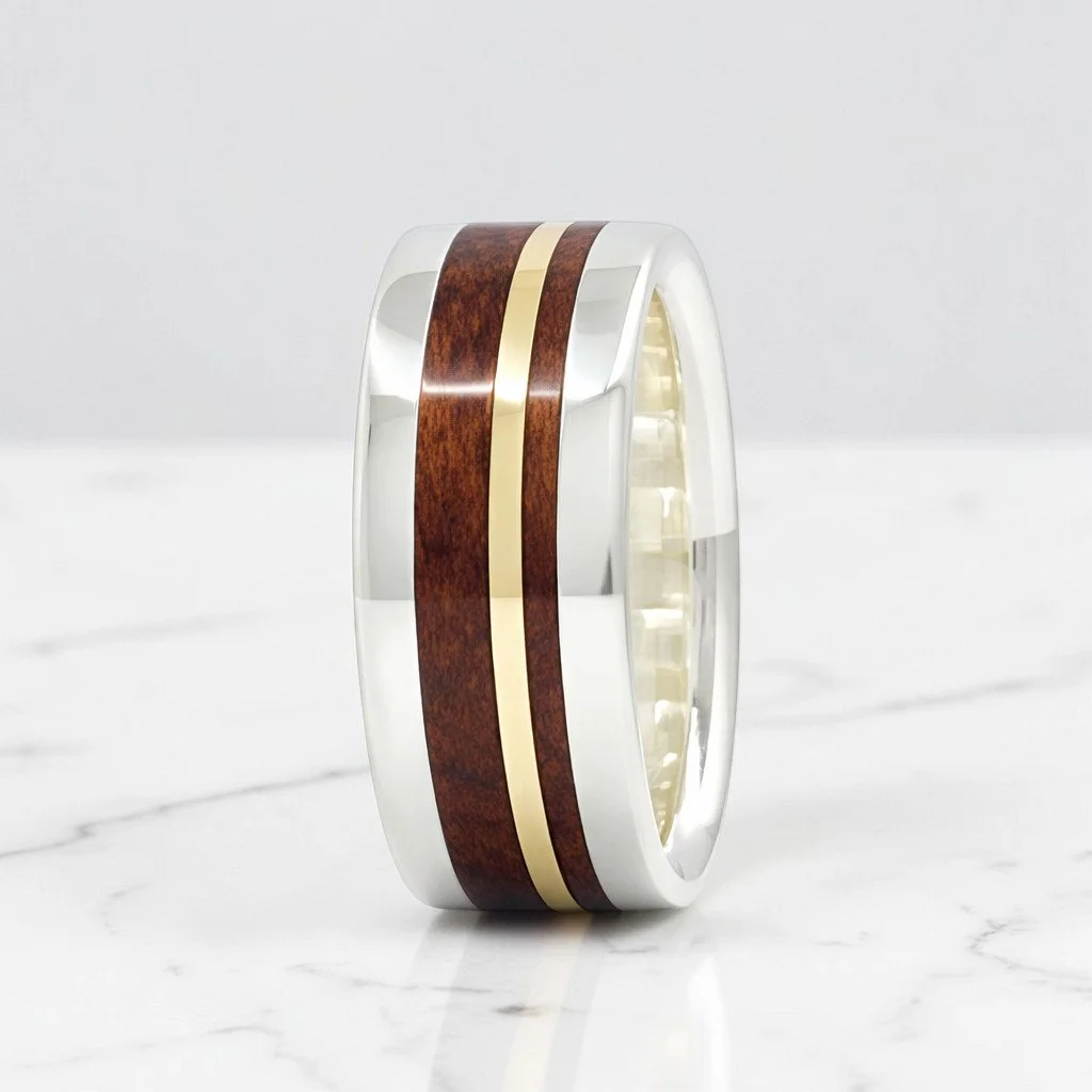 padauk wood and 10kY in ss offcentre on marble.jpg