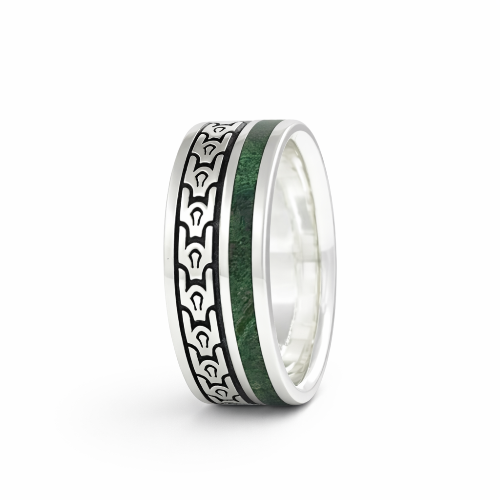 Green wood and textured design in silver ring