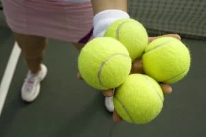 4tennsballs-in-hand_300px.jpg