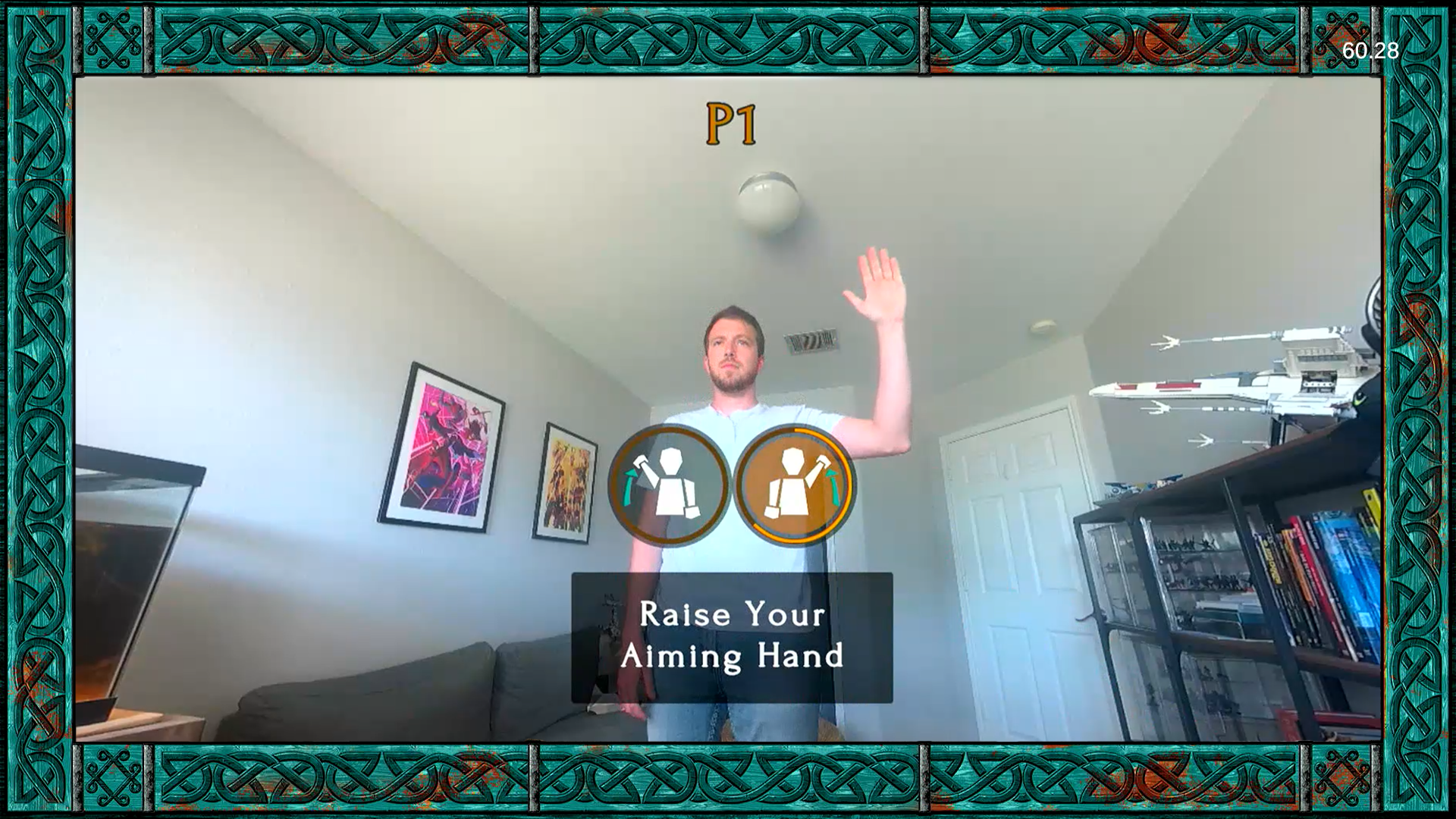 The player raises their hand to indicate which they'd like to aim with during the game's calibration