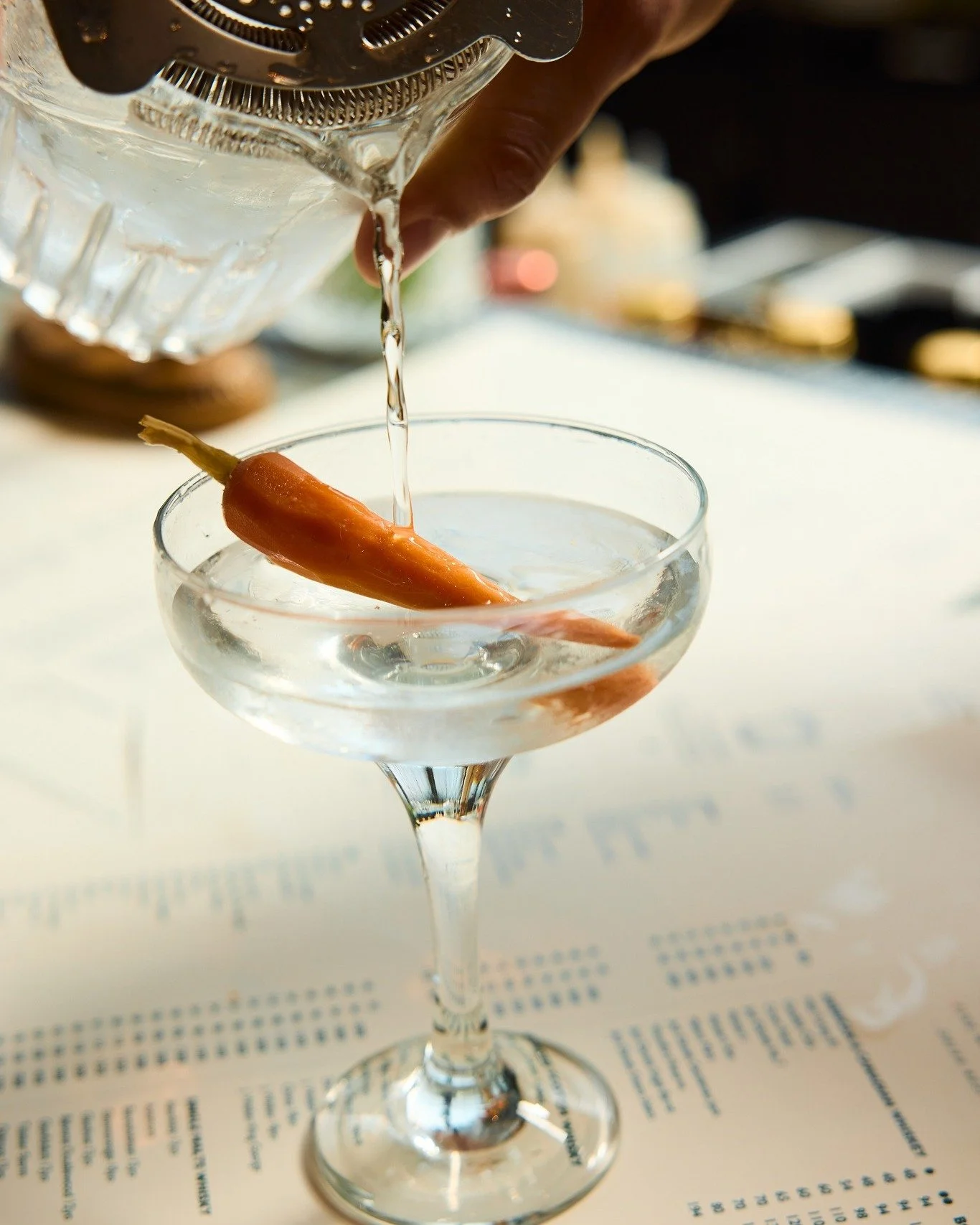 Thirsty? Try our Dirty Martini with a pickled carrot twist 🥕

 #TheMaine #themainedubai #themainedxb