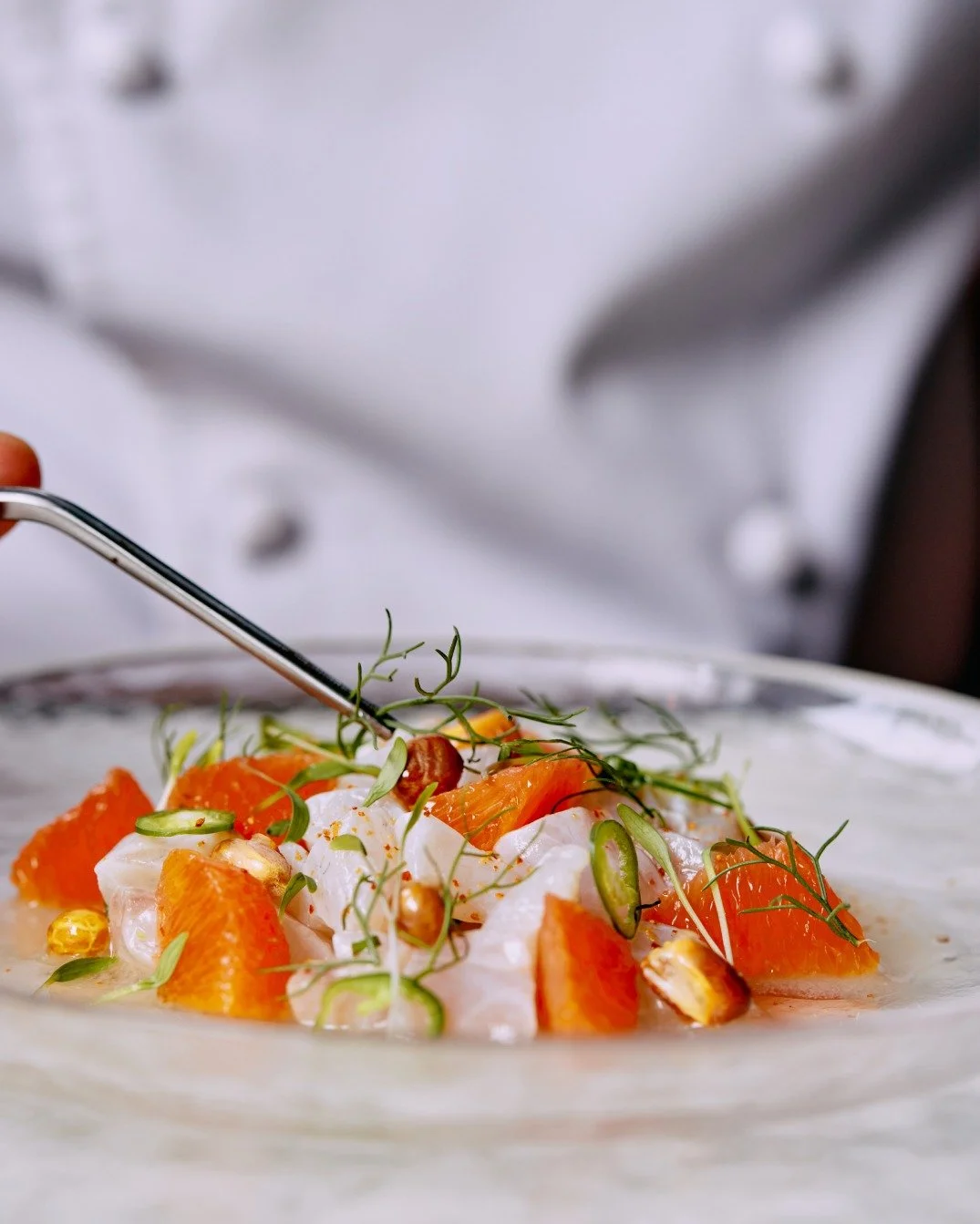A Raw Bar fave: seabass &amp; blood orange ceviche, scattered with chillies, scallions &amp; espelette pepper.

 #TheMaineDXB #TheMaine #dxb #dubai #seafood