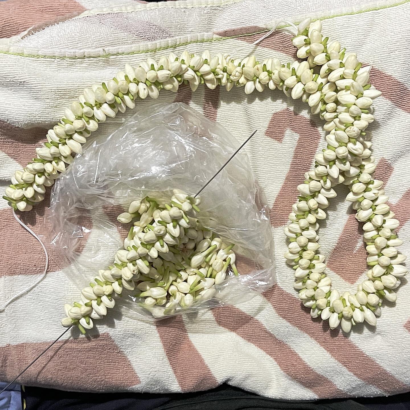 Sewing leis while watching Merry Monarch is a whole vibe #pikake #pikakelei