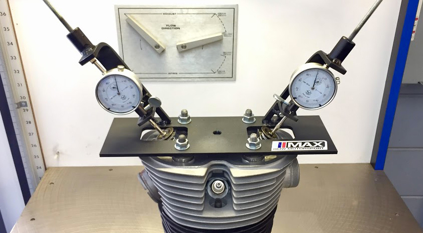 SUPERFLOW FLOW BENCH WITH CUSTOM AIRHEAD ADAPTERS AND VALVE FIXTURES MADE BY MAX BMW Motorcycles.
