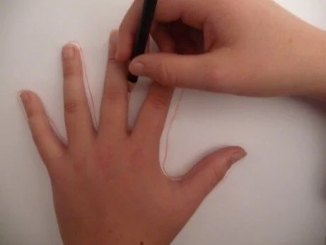 Draw around your own hand.