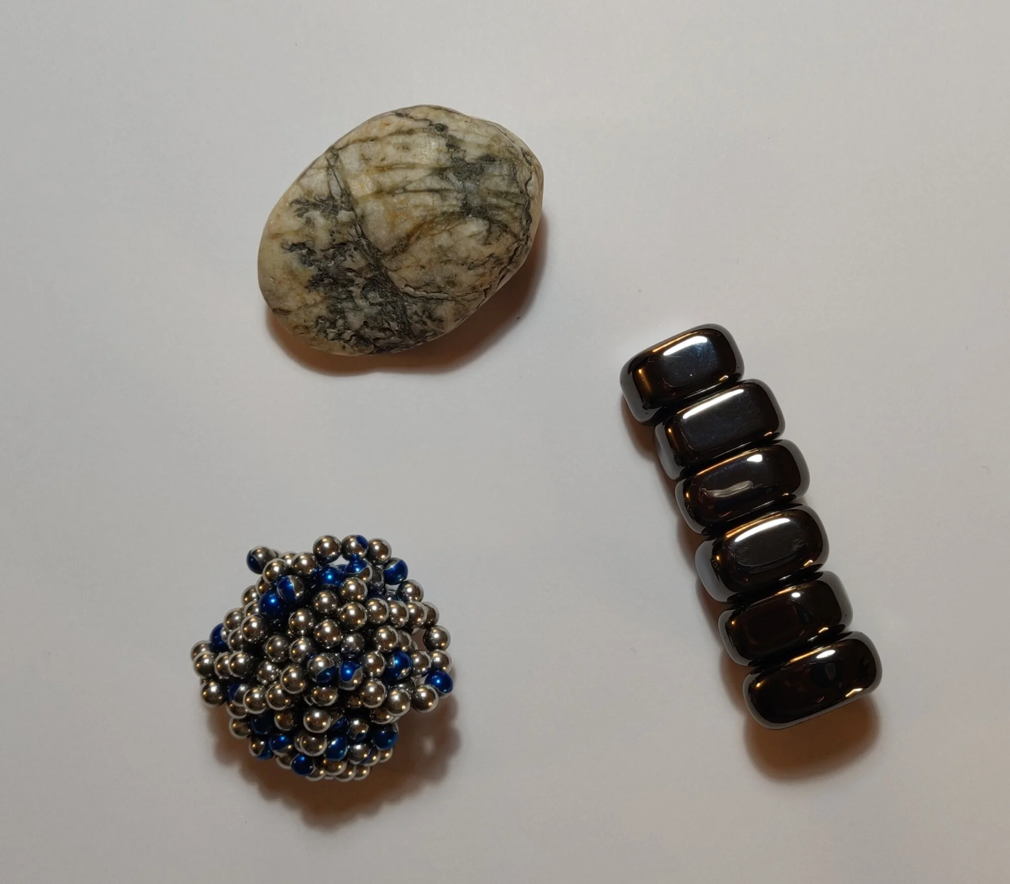  Pebbles and magnets are very effective objects to fiddle with whilst concentrating! 