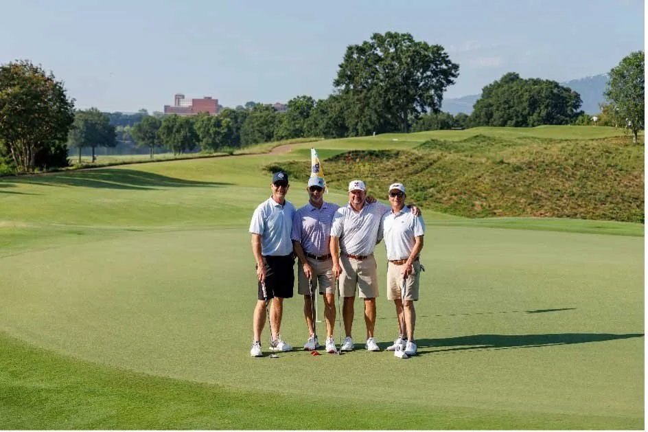 Presenting sponsor, Miller Industries, employees golfing