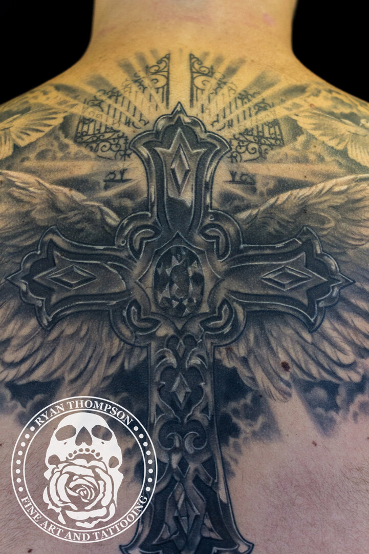 RyanThompsonTattoos_blackandgray_back_tattoo_cross_religious_angel_wings_doves-002.jpg