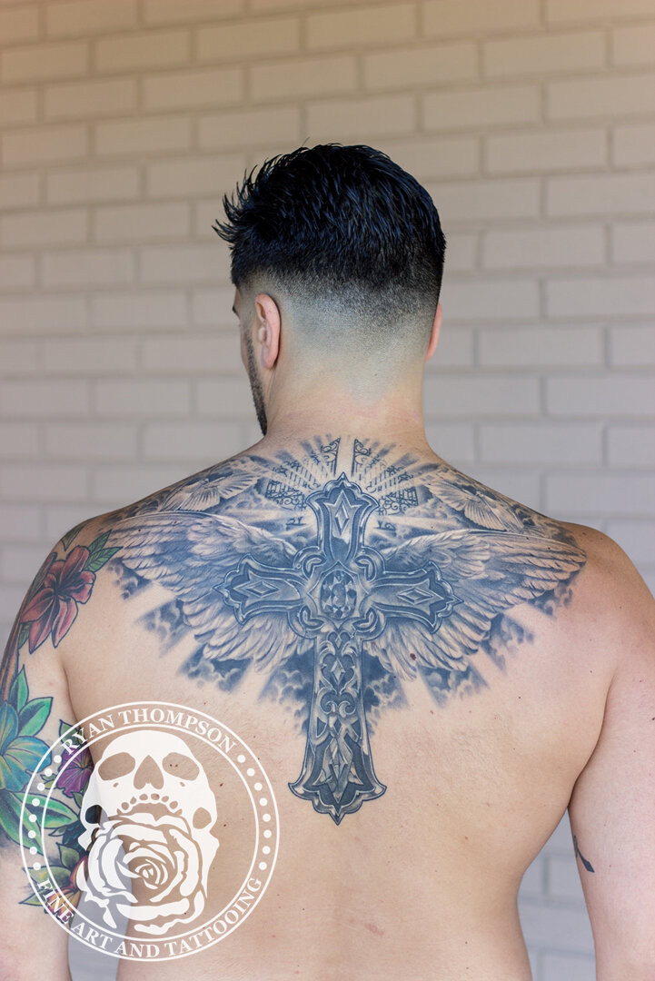 RyanThompsonTattoos_blackandgray_back_tattoo_cross_religious_angel_wings_doves-003.jpg