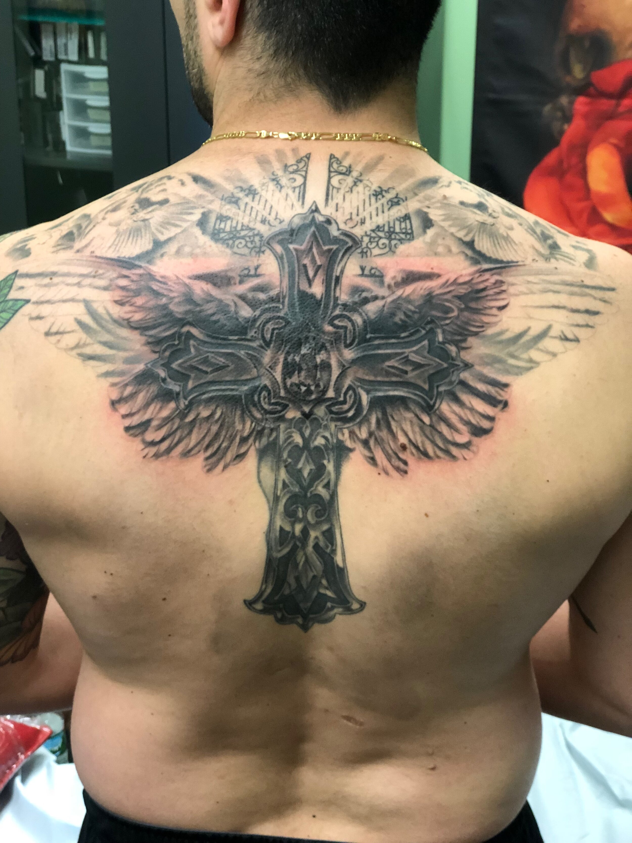 RyanThompsonTattoos_blackandgray_back_tattoo_cross_religious_angel_wings_doves-006.jpg