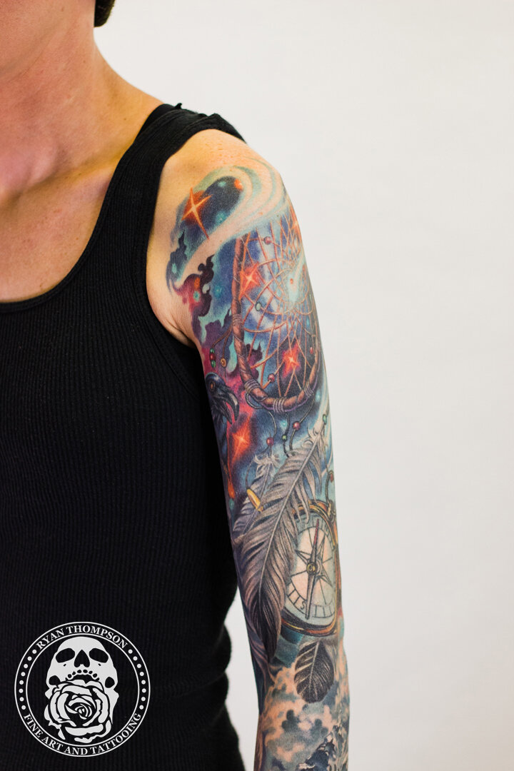 RyanThompsonTattoos_color_tattoo_sleeve_space_raven_dreamcatcher_compass_mountain_feather_coverup-003.jpg