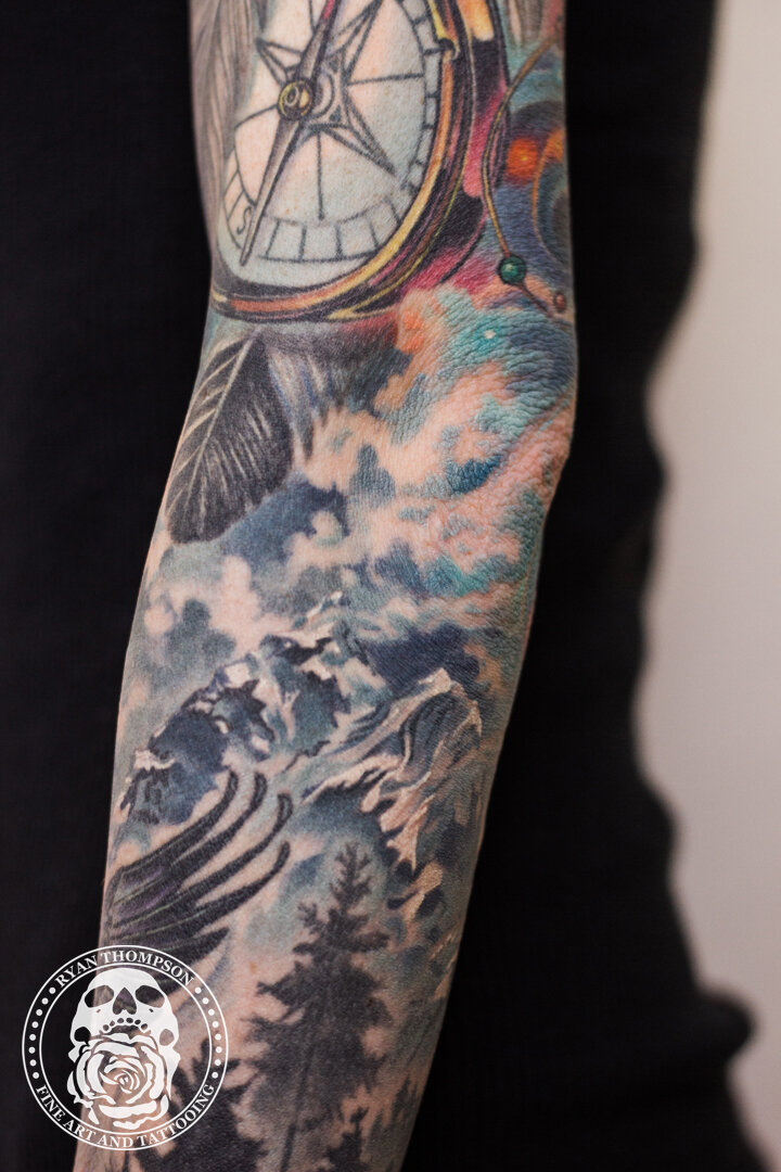 RyanThompsonTattoos_color_tattoo_sleeve_space_raven_dreamcatcher_compass_mountain_feather_coverup-009.jpg