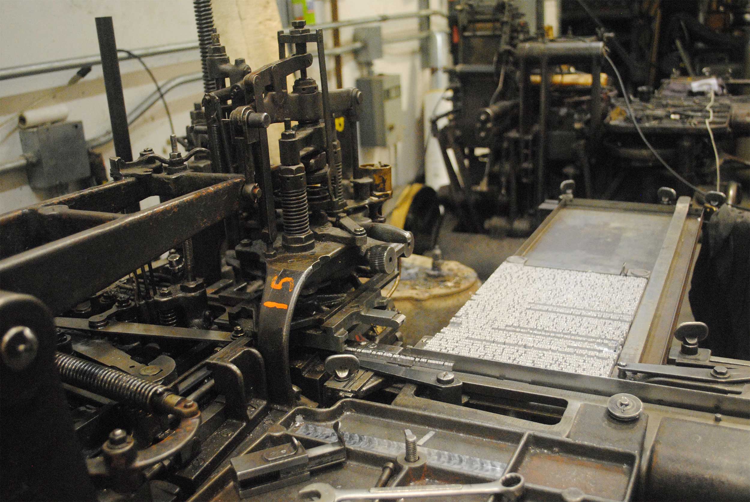  A galley of metal type on the Monotype caster 