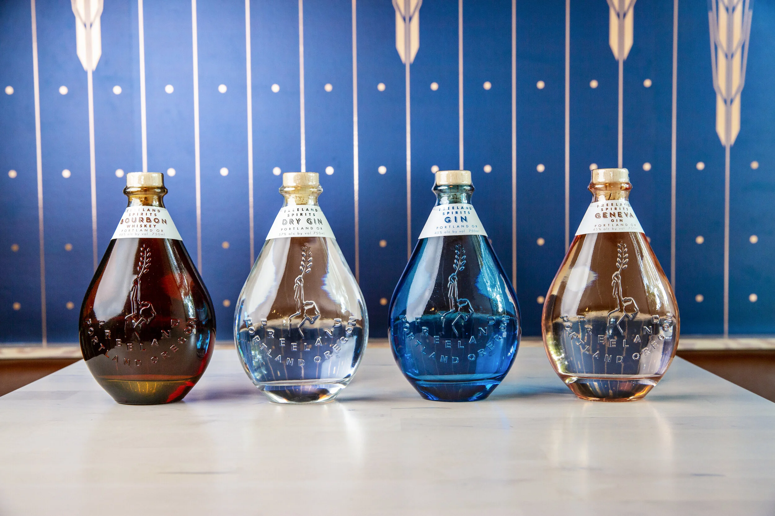 Freeland Spirits Portland Oregon Woman Owned GIN BOURBON GENEVA CANS