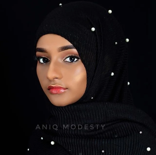 Model Umu Bah wearing a hijab from the new collection from ANIQ modesty.