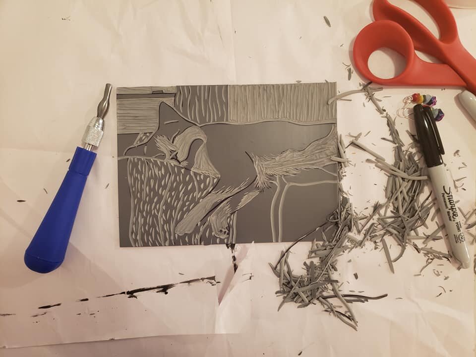 Carving out a linoleum block