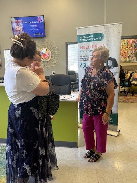 mom+and+volunteer+talking.jpg
