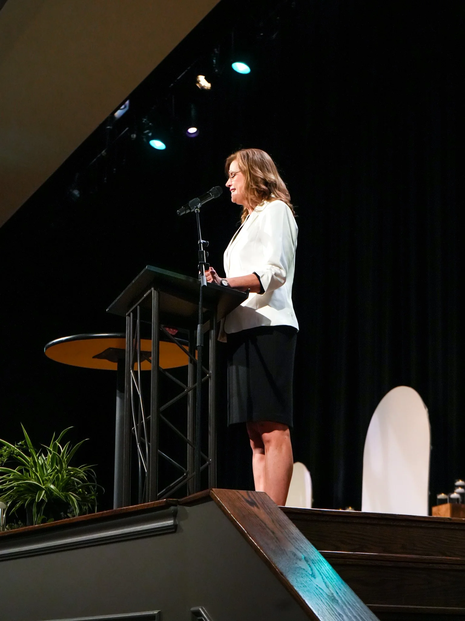 Heather speaking from side zoom out.jpg