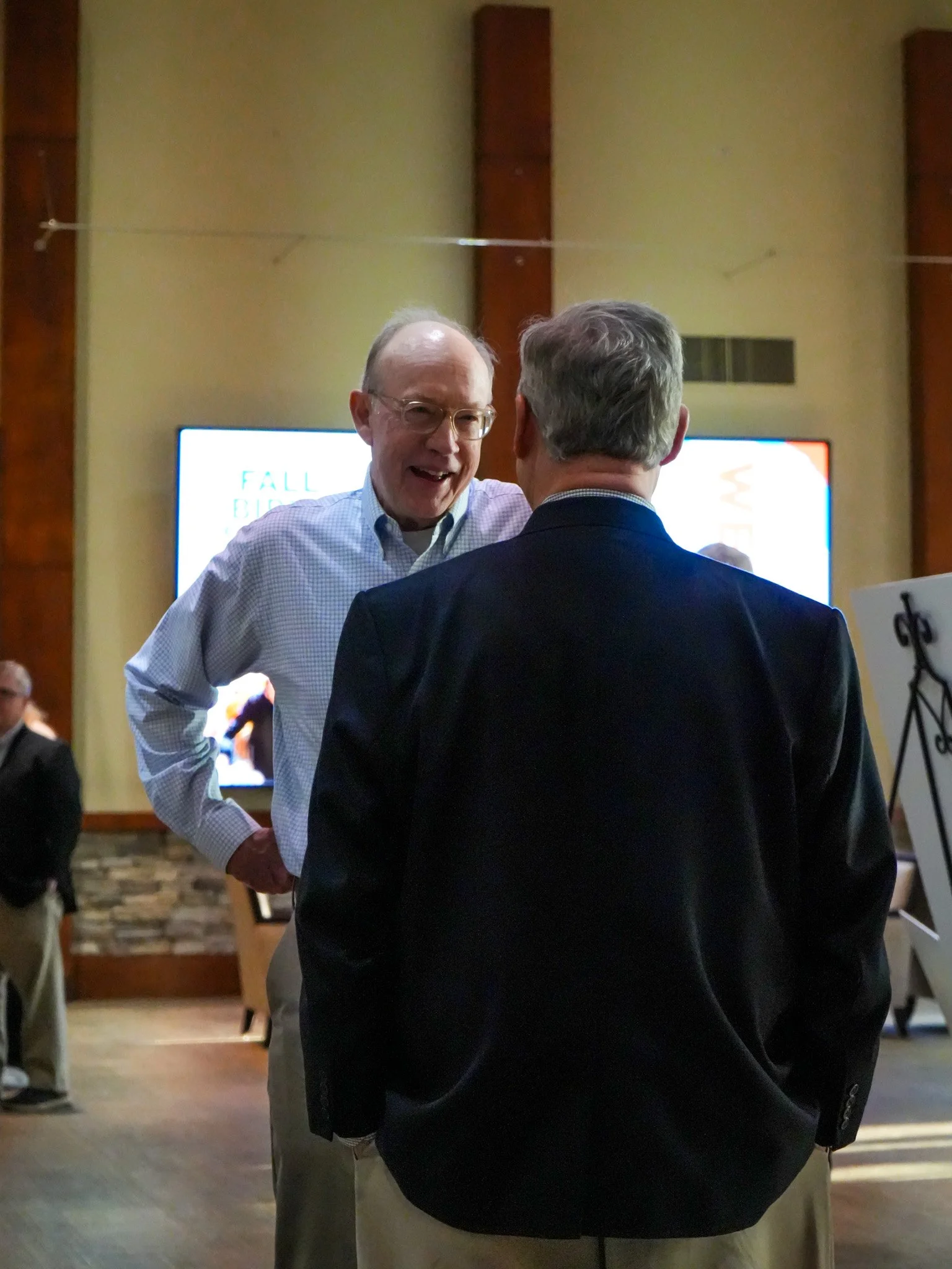 guests talking outside registation.jpg