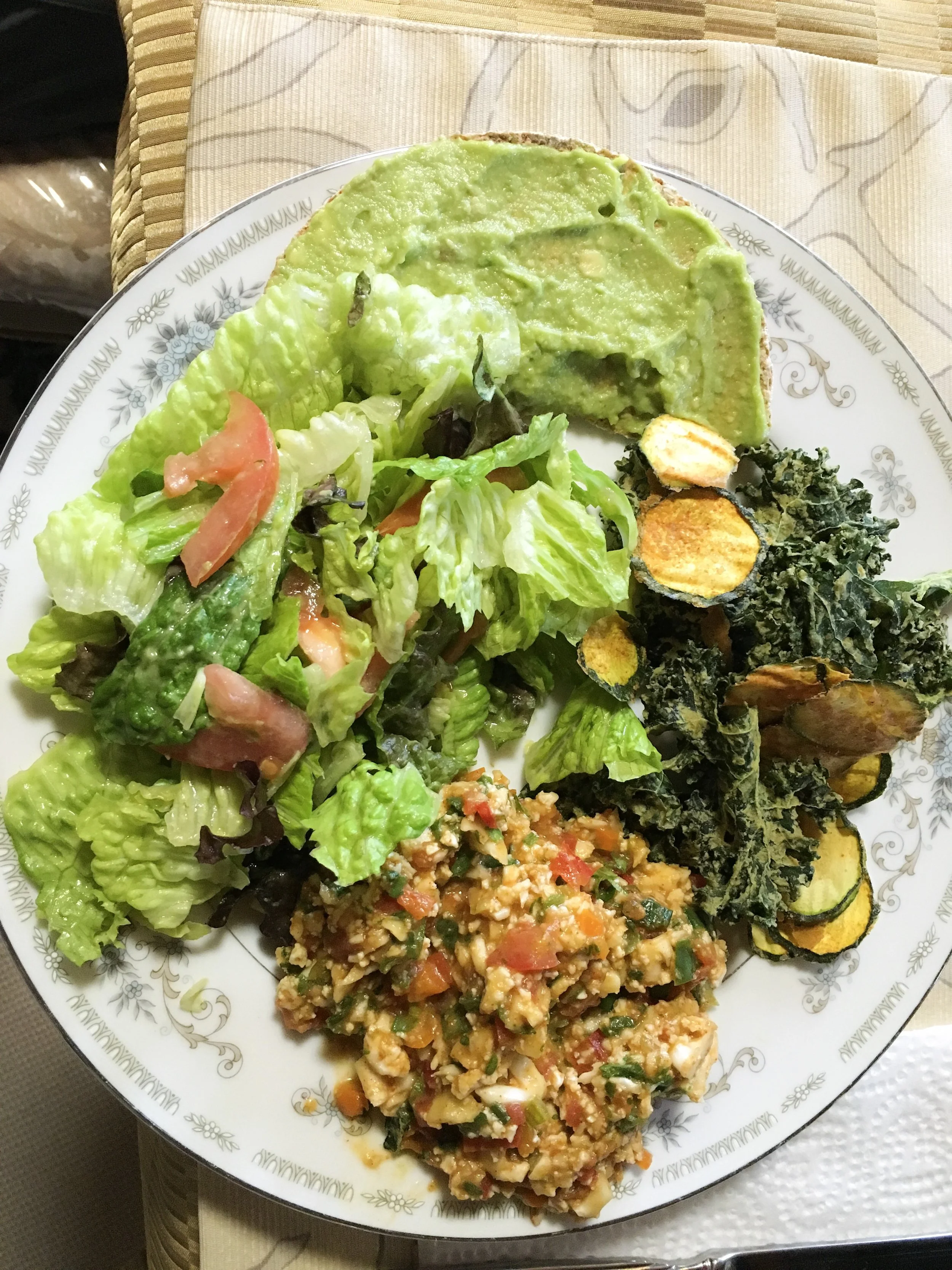 The red and white dish below is made with raw cauliflower and numerous other vegetables. Kale and zucchini chips are in the above right, and of course a large salad.