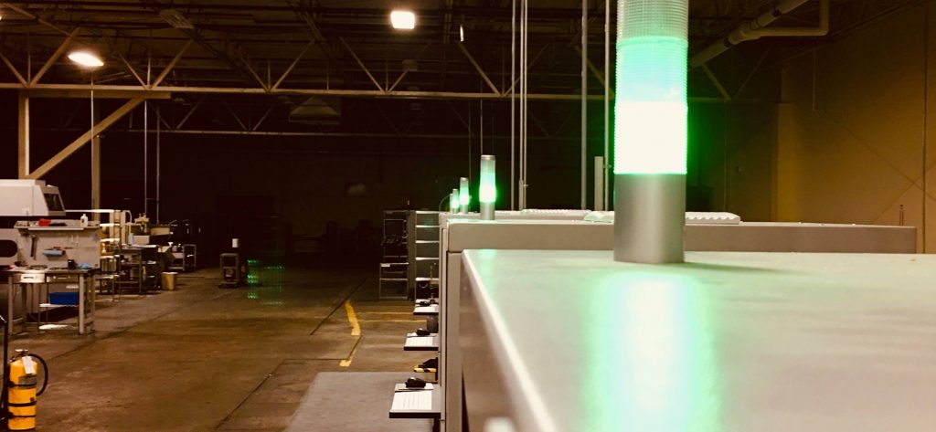 Fleet of Concept Laser 3D printers at Tangible Solutions. Photo via Tangible Solutions