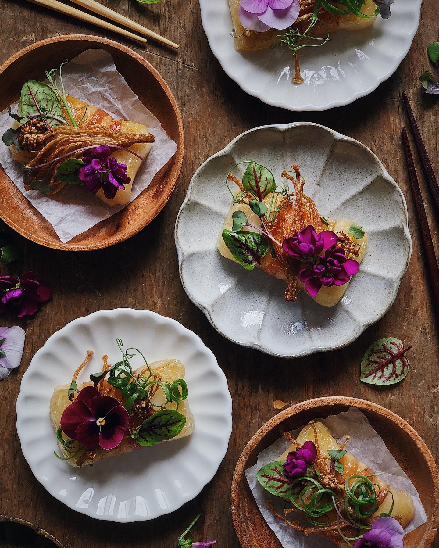 Bacon-wrapped mochi with a sweet soy glaze. Topped with crispy fried enoki mushrooms, scallions, whole grain mustard, microgreens, and bits from my garden. ⁣
⁣
So, bacon-wrapped mochi is just as good as it sounds. To make it, I used packaged kirimoch