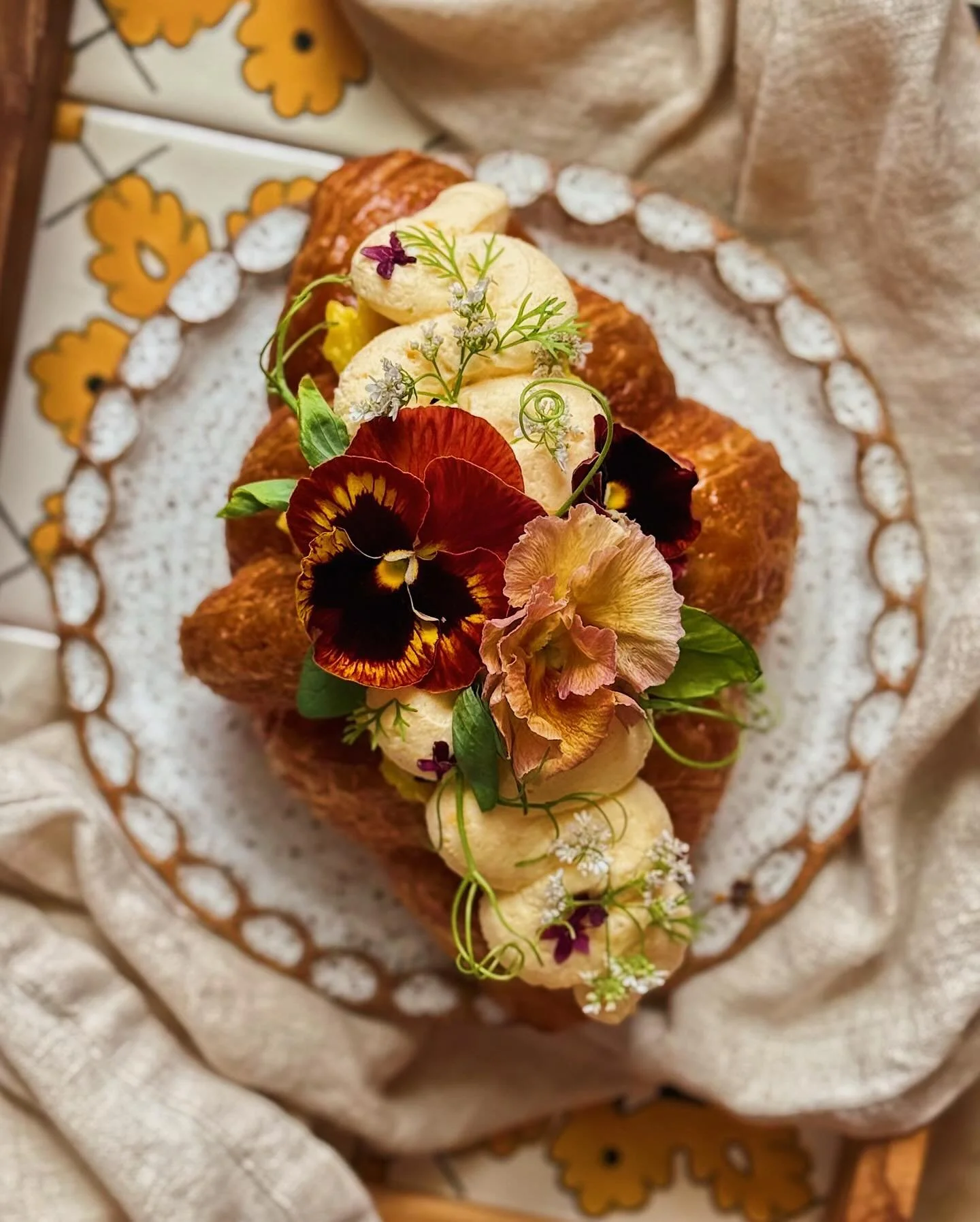 I&rsquo;m calling this the spicy double egg stuffed croissant. I used a croissant from my local bakery and stuffed it with fluffy scrambled eggs and Lao Gan Ma chili crisp, then finished off with a piping of salted egg yolk whipped ricotta. The decor