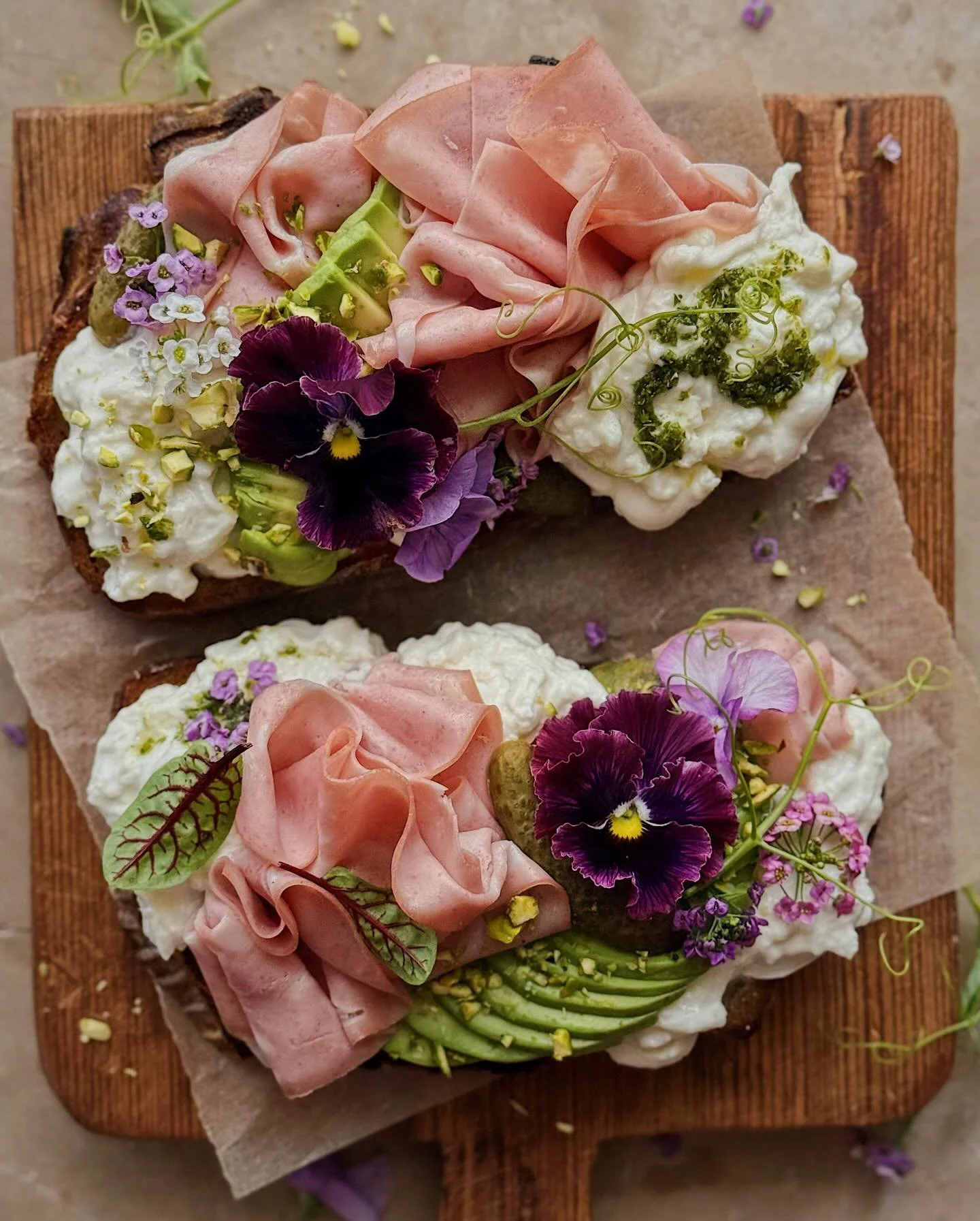Avocado, mortadella, pickle,  and burrata toasts. These toasts started off with a light spread of dijon mustard, and then got topped with a decadent amount of burrata, sliced avocado, gentle drapings of mortadella, and a few cornichons; chopped pista