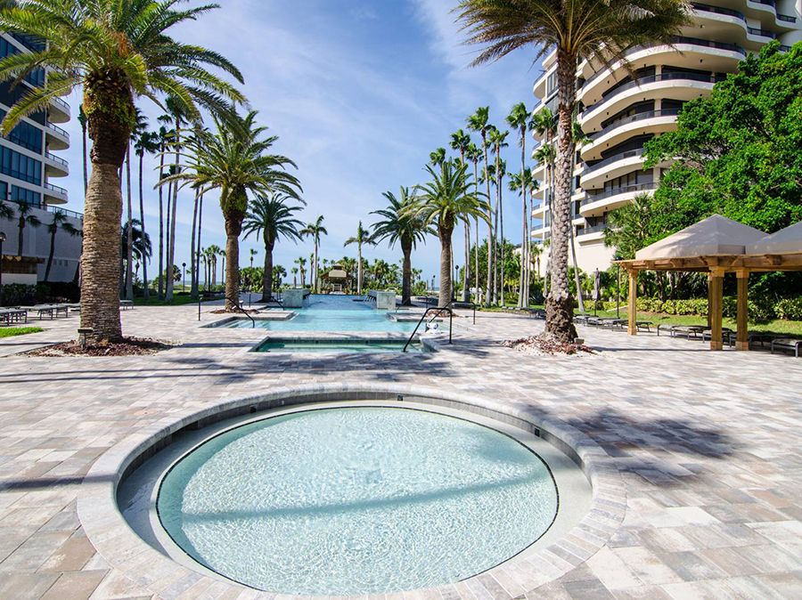 LAmbiance-Commercial-pool-deck-with-pavers-and-travertine-combined.jpg