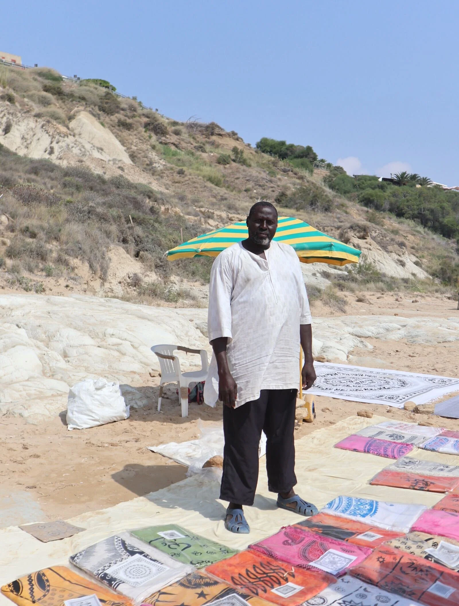 friendly towel seller on the scala dei turchi beach