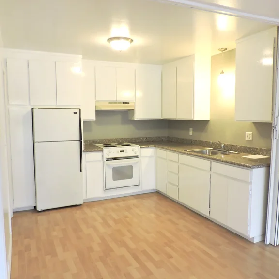 Bright airy kitchen with room for dining
